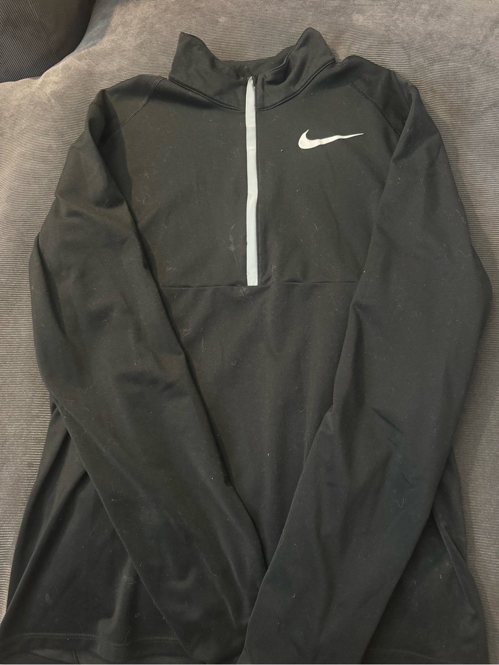 Nike Black Half-Zip Performance Pullover with White Swoosh